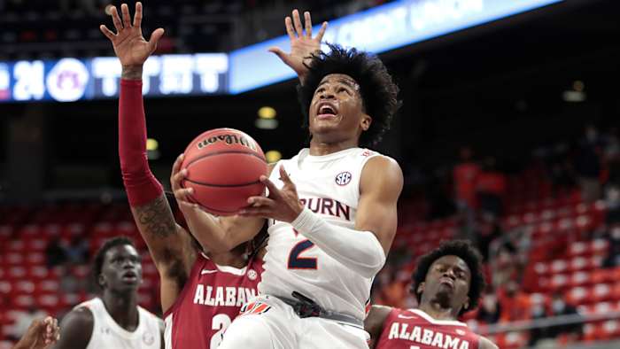 Auburn Tigers guard Sharife Cooper takes a shot against the Alabama Crimson